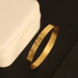 Divine Radiance Gold-Plated RAM Engraved Bangle